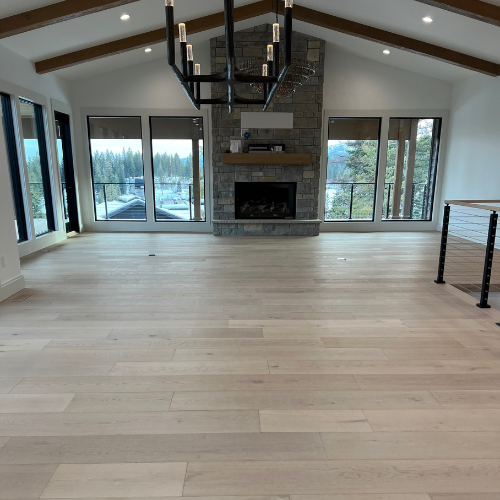 living room showroom picture, large windows, overhead lighting